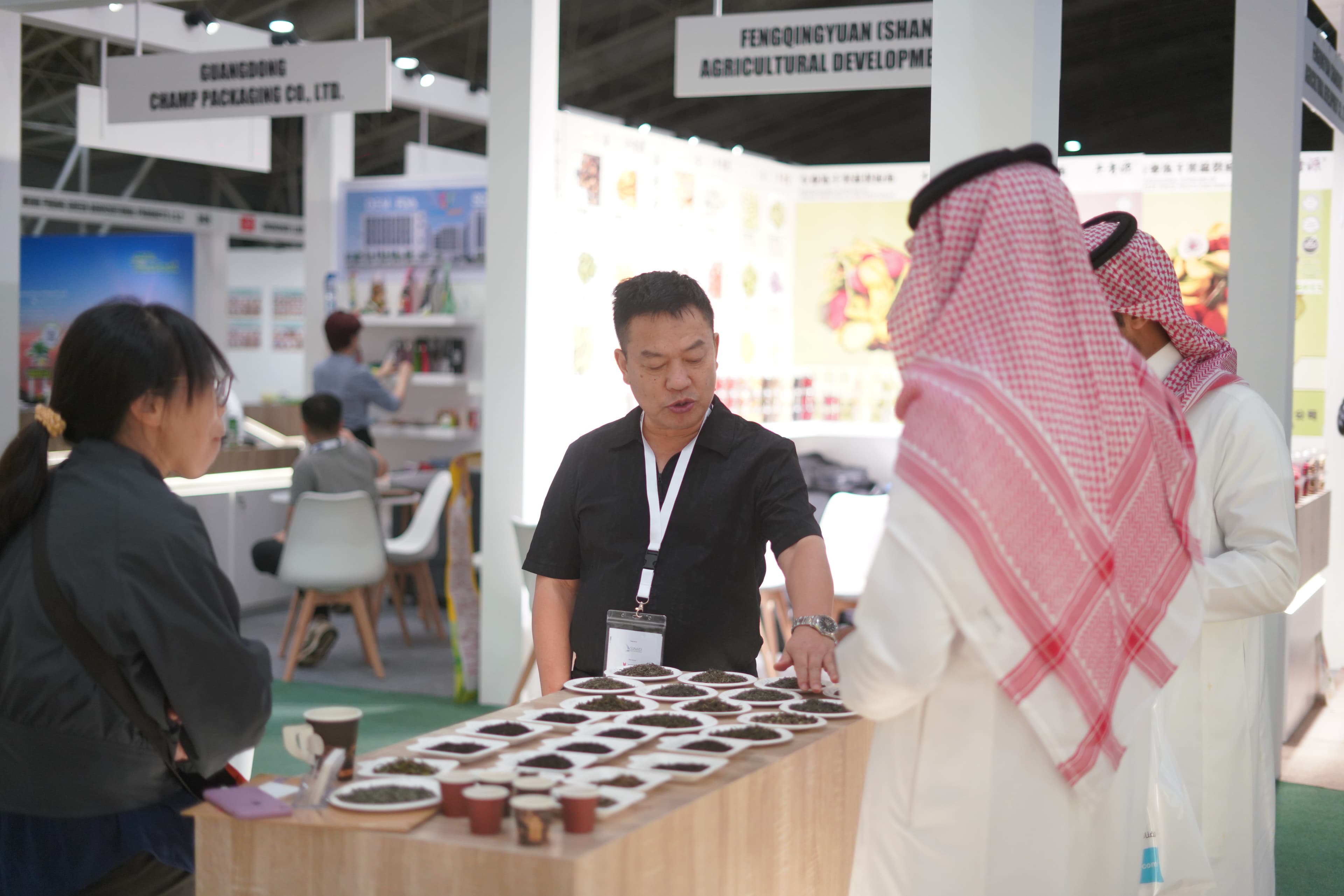 Buyers sampling products at stands